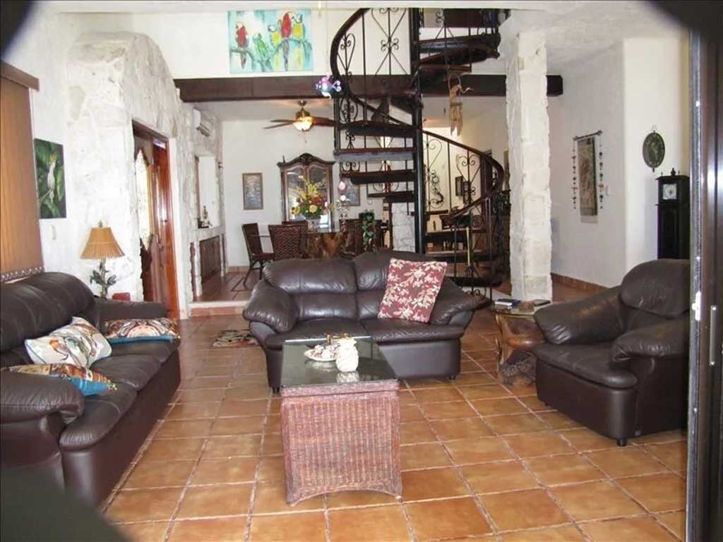 Casa Pajaros Living Room with Spiral Staircase